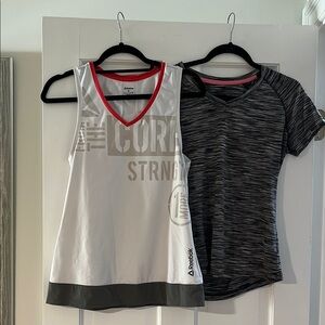 2 gently used workout shirts -smoke free home